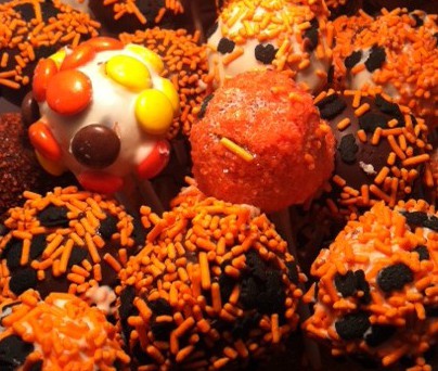 Cake Pops with Black and Orange Sprinkles and Reeces Pieces